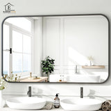 Oglinda Decorativa 122x75 cmElindor® Agatare pe Perete sau Sprijinita, Neagra, Dreptunghiulara, Colturi Rotunjite, Moderna si Eleganta, Reflexie HD, Sticla fara Distorsiuni, Ideala pentru Dormitor, Living, Birou, Dressing, Hol, Baie, Rama Metalica,