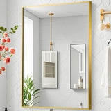 Oglinda Decorativa Elindor® Agatare pe Perete sau Sprijinita, Aurie, Dreptunghiulara, Moderna si Eleganta, Reflexie HD, Sticla fara Distorsiuni, Ideala pentru Dormitor, Living, Birou, Dressing, Hol, Baie, Rama Metalica, 90 x 60 cm