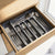 Organizator Elindor® pentru Tacamuri si Ustensile de Bucatarie, 5-7 Compartimente, Sertar Extensibil, Suport Ajustabil pentru Cutite, Linguri, Furculite, Accesorii Bucatarie, Separator Sertar, 31 × 21.5 × 4 cm, Gri