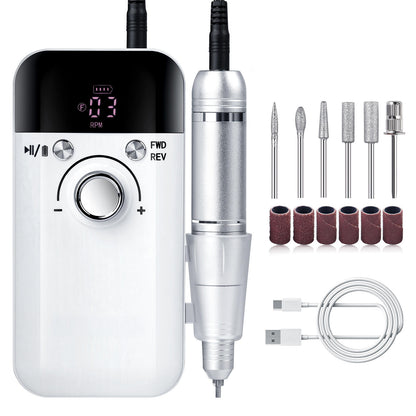 Freza Unghii Electrica Elindor® cu Suport Pila Electrica Reincarcabila, Set Complet de Ingrijire pentru Manichiura si Pedichiura Profesionala, Cuticule sau Calcaie, 45000 RPM, Viteza Reglaj Continuu, 6 Capete Detasabile, 6 Benzi Abrazive, Ecran LCD, Alb