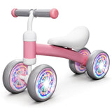 Bicicleta fara Pedale Elindor® pentru Copii, cu 4 Roti cu LED, Usoara, Silentioasa, Robusta, Sa Ergonomica, Dezvolta Echilibrul si Coordonarea, pentru Copii de 10-36 Luni, 55 x 19 x 24.5 cm, Roz