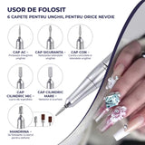 Freza Unghii Electrica Elindor® cu Suport Pila Electrica Reincarcabila, Set Complet de Ingrijire pentru Manichiura si Pedichiura Profesionala, Cuticule sau Calcaie, 45000 RPM, Viteza Reglaj Continuu, 6 Capete Detasabile, 6 Benzi Abrazive, Ecran LCD, Alb