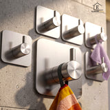 Set 6 Carlige Adezive Elindor® din Otel Inoxidabil, Montare Fara Gaurire, Greutate Mxima Suportata 10 kg, Design patrat si Colturi Rotunjite, Instalare Usoara, Ideal pentru Baie, Bucatarie sau Birou, 4.5 x 4.5 cm, Argintiu