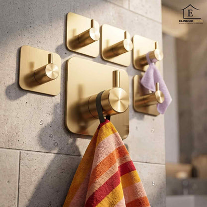 Set 6 Carlige Adezive Elindor® din Otel Inoxidabil, Montare Fara Gaurire, Greutate Mxima Suportata 10 kg, Design patrat si Colturi Rotunjite, Instalare Usoara, Ideal pentru Baie, Bucatarie sau Birou, 4.5 x 4.5 cm, Auriu
