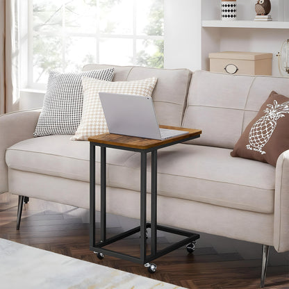 Masa de Cafea Laterala Elindor® in Forma de C, Design Industrial, Ideala pentru Living, Birou, Dormitor, Mobila mUltifunctionala, Moderna, Greutate Maxima Suportata 25 kg, Roti Detasabile Incluse, 50 x 35 x 60 cm, Maro / Negru