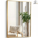 Oglinda Decorativa Elindor® Agatare pe Perete sau Sprijinita, Aurie, Dreptunghiulara, Moderna si Eleganta, Reflexie HD, Sticla fara Distorsiuni, Ideala pentru Dormitor, Living, Birou, Dressing, Hol, Baie, Rama Metalica, 90 x 60 cm