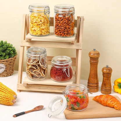 Borcane din sticlă cu închidere ermetică, utilizate pentru depozitarea alimentelor uscate și decorarea bucătăriei.