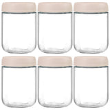 Set de 6 borcane din sticlă transparentă, cu capac din plastic bej, ideale pentru depozitare.